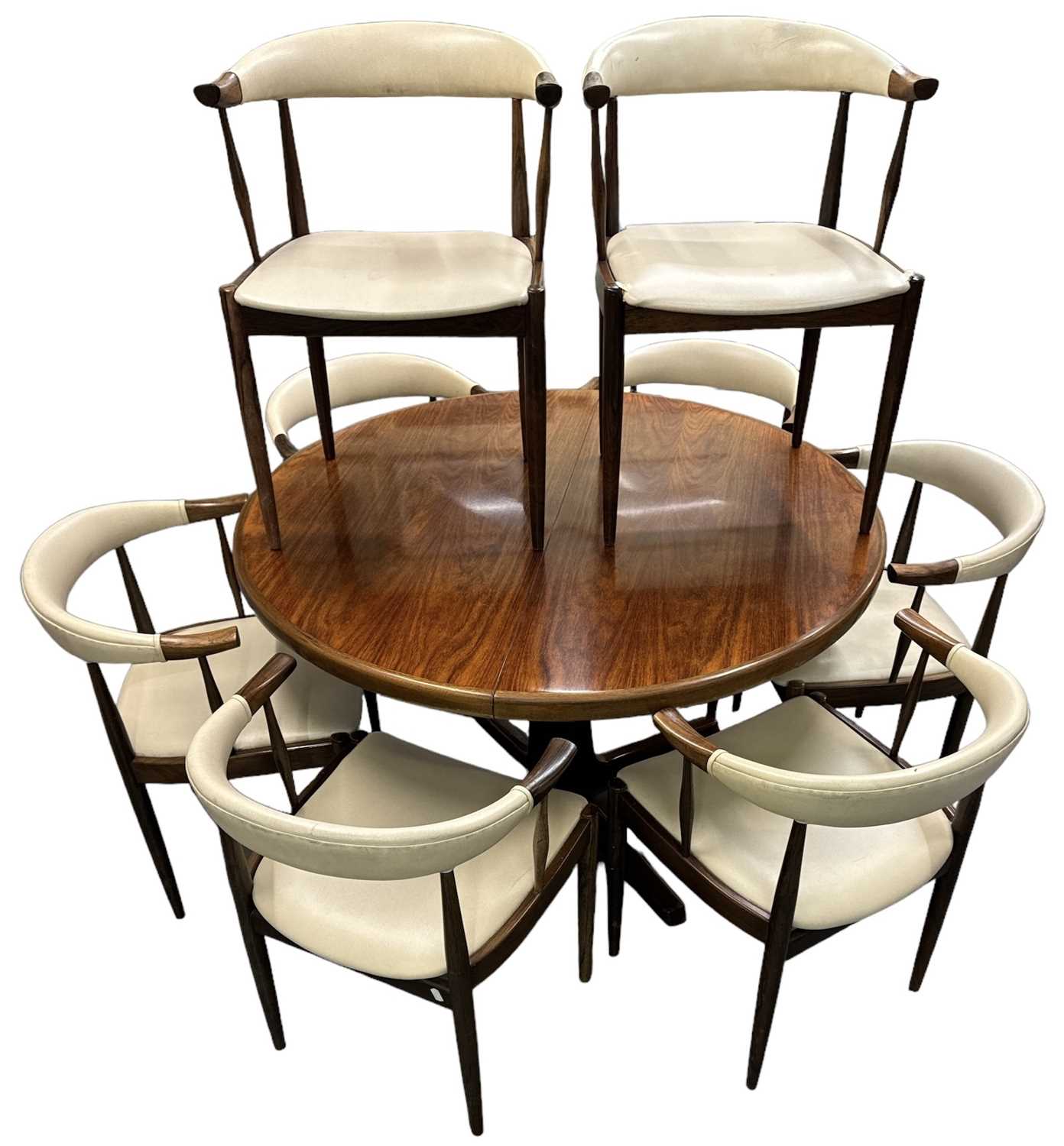 Lot 10 - A 1970s rosewood circular extending dining...