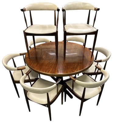 Lot 10 - A 1970s rosewood circular extending dining...