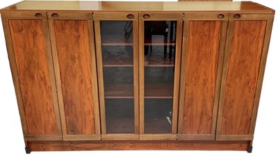 Lot 28 - A 1970s rosewood display cabinet with pair of...
