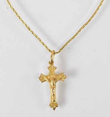 Lot 1527 - A yellow metal necklace suspending a yellow...