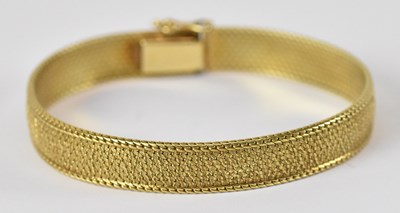 Lot 1446 - A 14ct yellow gold bracelet, length 20cm,...