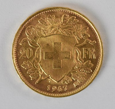 Lot 1586 - A 1947 Swiss franc gold coin, diameter 2cm,...