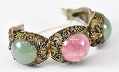 Lot 1475 - A Chinese silver gilt jade and rose quartz set...