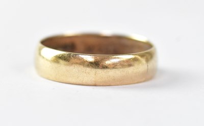 Lot 965 - A 9ct yellow gold wedding band, size V, approx....