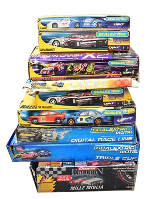 Lot 762 - Nine slot car box sets, all parts complete,...