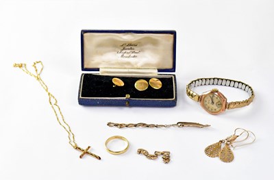 Lot 1018 - A collection of gold and yellow metal...
