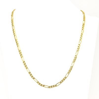 Lot 998 - A 9ct gold Figaro link necklace with ring...