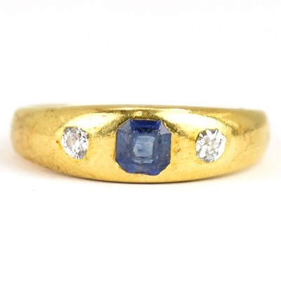 Lot 963 - An 18ct gold ring set with flush fit cut...