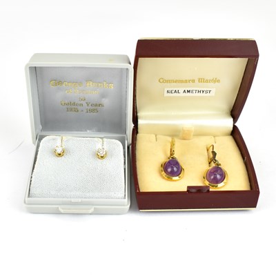 Lot 1014 - A pair of 9ct gold mounted diamond stud...