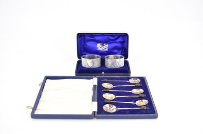 Lot 909 - A cased set of six silver teaspoons with...