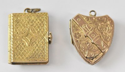 Lot 1478 - A yellow metal heart shaped locket pendant...