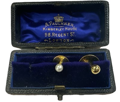 Lot 1479 - An 18ct yellow gold dress stud and an 18ct...