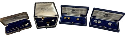 Lot 1519 - Two 9ct yellow gold studs, three yellow metal...