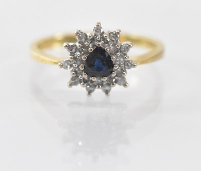 Lot 1454 - An 18ct yellow gold sapphire and diamond set...