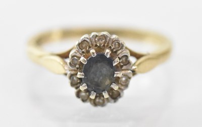 Lot 1501 - A 9ct yellow gold sapphire and diamond set...
