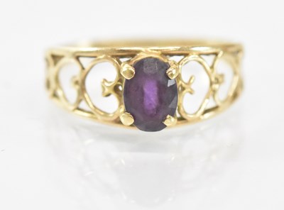 Lot 1549 - A 14ct yellow gold ring set with central...