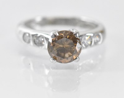Lot 1423 - An 18ct white gold single stone diamond ring,...