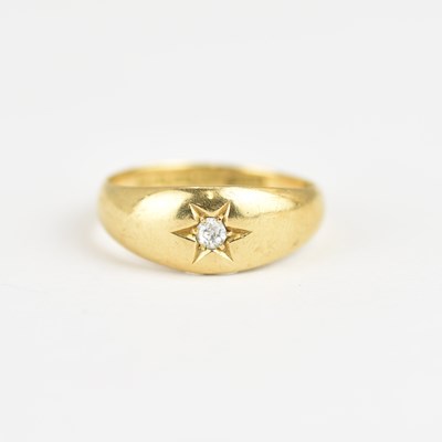 Lot 950 - An 18ct gold ring with star inset tiny...