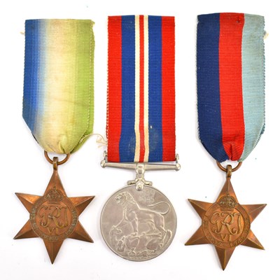 Lot 587 - Three WWII medals comprising a Silver War...