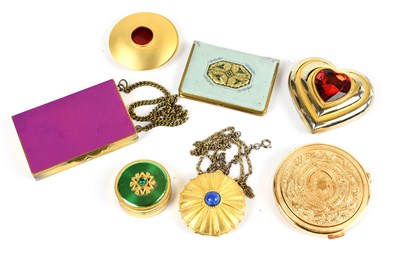 Lot 832 - YVES SAINT LAURENT; a heart shaped gold tone...