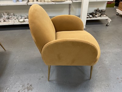 Lot 77 - A modern yellow upholstered armchair on gilt...