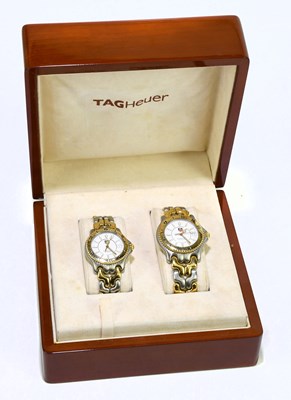 Lot 1642 - TAG HEUER; a pair of his and hers bi-metallic...