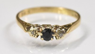 Lot 1504 - A 9ct yellow gold sapphire and diamond set...