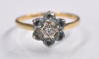 Lot 1481 - An 18ct yellow gold diamond and aquamarine set...