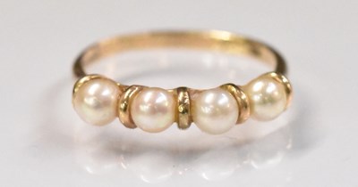 Lot 1516 - A 9ct yellow gold seed pearl set ring, size N,...