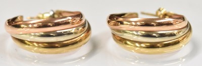 Lot 1512 - A pair of 9ct tricolour yellow, white and rose...