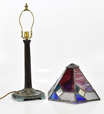 Lot 2040 - A Tiffany style patinated metal table lamp,...