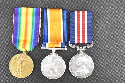 Lot 609 - A three medal group comprising Military Medal...