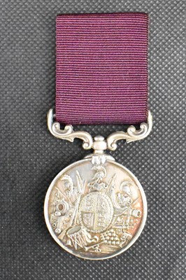 Lot 599 - A Victorian military medal 'For Long Service...