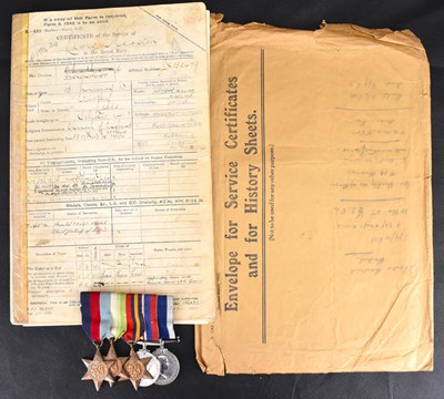 Lot 607 - A WWII group of four medals comprising the...