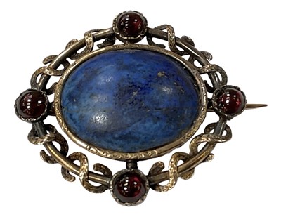 Lot 1480 - A yellow metal brooch set with central lapis...
