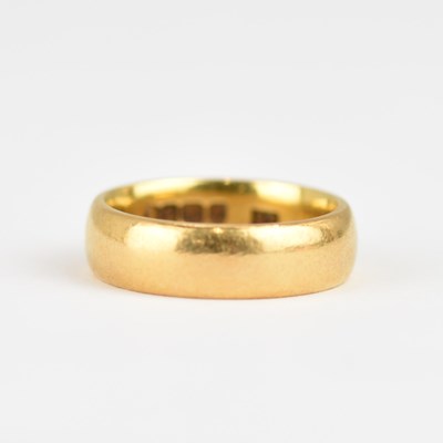Lot 941 - A 22ct gold wedding band, size H, approx. 5.7g.