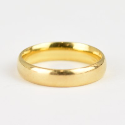 Lot 942 - A 22ct gold wedding band, size K, approx. 4.2g.