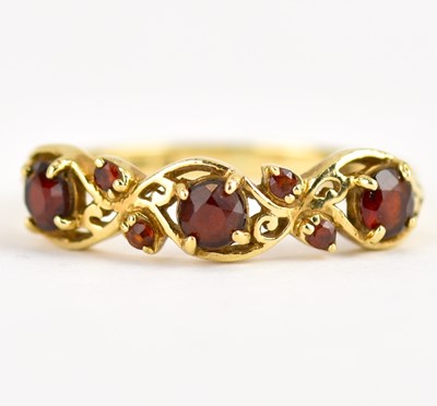 Lot 974 - A 9ct gold ring set with three claw set...
