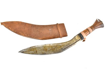 Lot 513 - A Kukri with wooden handle and leather...