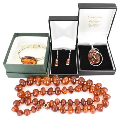 Lot 1021 - Various items of modern amber jewellery...