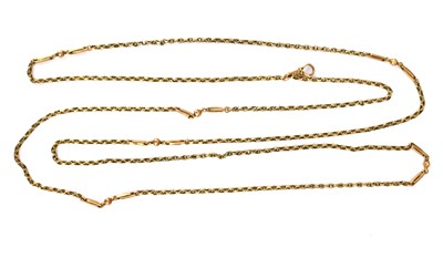Lot 1005 - A 9ct rose gold muff chain with swivel clasp...
