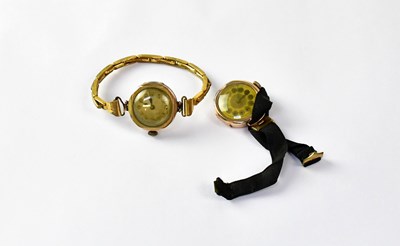 Lot 1074 - Two 9ct gold wristwatches, one with dial set...