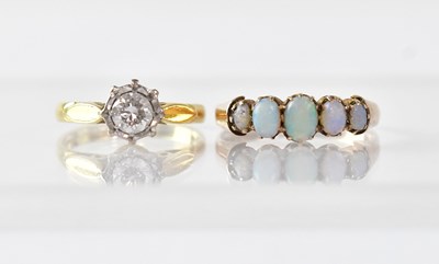 Lot 977 - A 9ct gold dress ring illusion set with white...