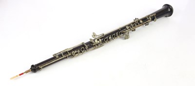 Lot 1123 - A modern ebonised oboe, cased.