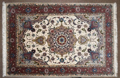 Lot 2659 - A fine quality Persian Tabriz rug, with floral...