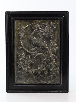 Lot 2083 - An Arts & Crafts sheet pewter wall plaque...