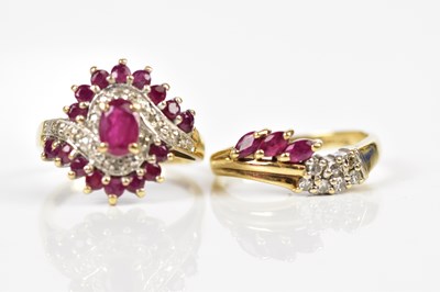 Lot 2429 - Two 9ct yellow gold simulated ruby dress rings,...