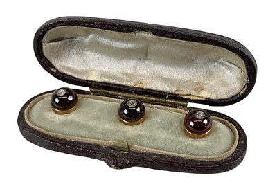 Lot 1558 - A Victorian cased set of three garnet and...