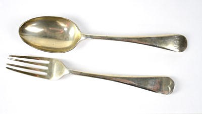Lot 674 - A George V hallmarked silver Fiddle pattern spoon and fork