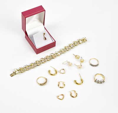 Lot 331 - A yellow metal diamond and emerald ten stone...
